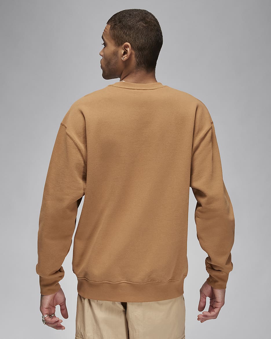 Nike essentials crew neck sweatshirt in orange online